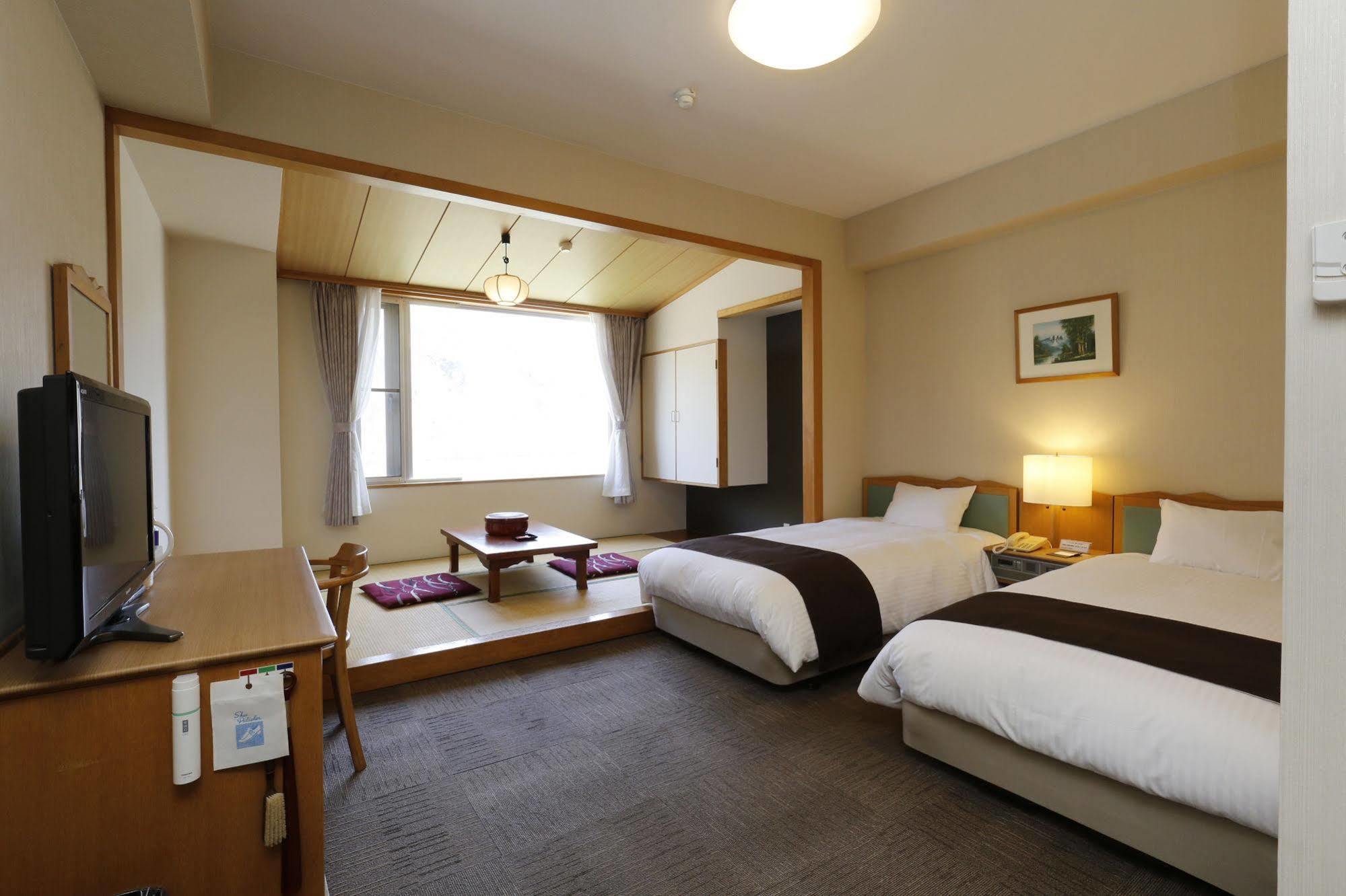 Yuyado Kuttari Onsen Lake Inn Shintoku Bagian luar foto